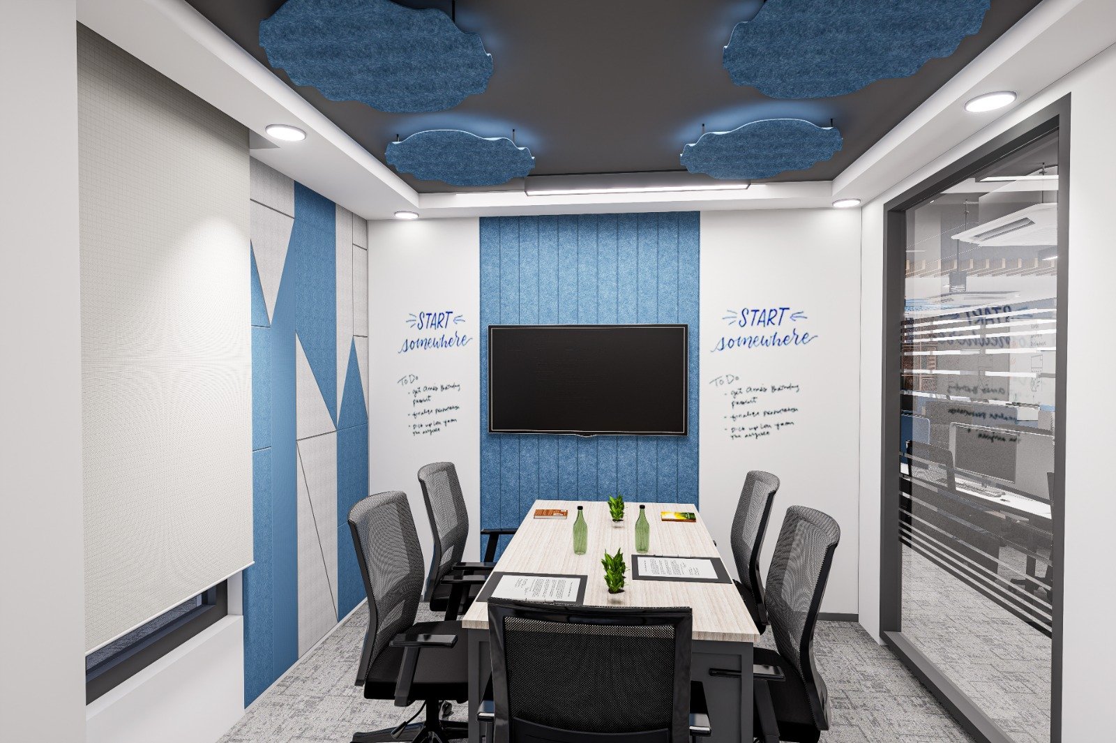 Meeting area with coordinated seating and acoustic ceiling elements in a Kan Systems project