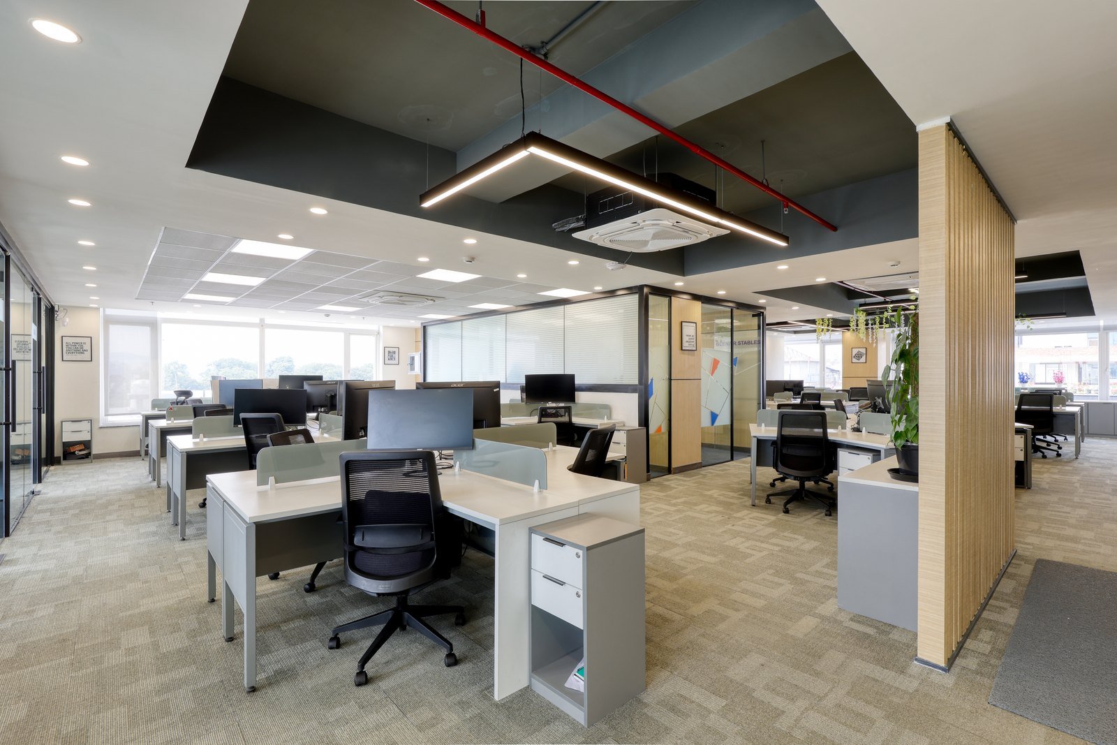 Open office workstations, mesh chairs and storage pedestals at Cpl India, New Delhi
